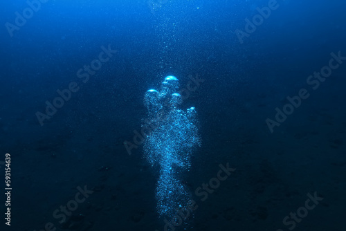 Foto air bubbles underwater background diving in the sea