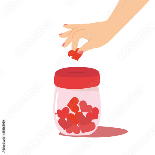 Hand holding a red hearts and putting into donation jar, charity concept.