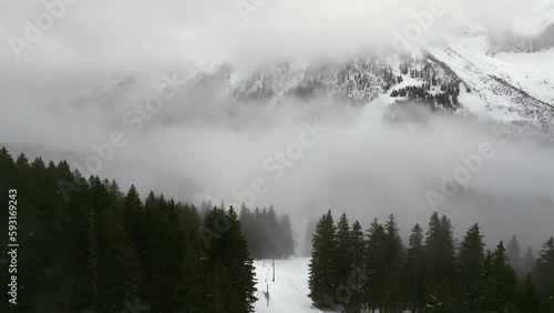 aerial view of snowy swiss mountains photo