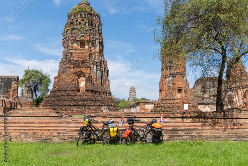 two touring bikes loaded with bags at Bueng Phra Ram Park temple photo