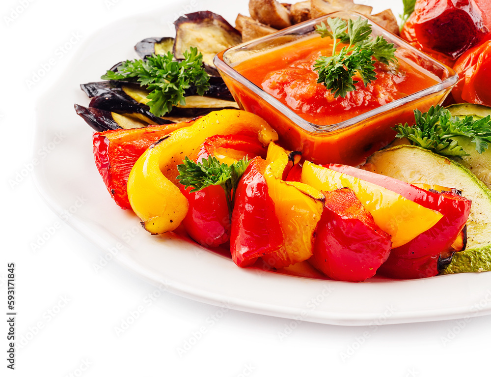 Grilled colorful vegetables on white plate Grilled colorful vegetables on white plate