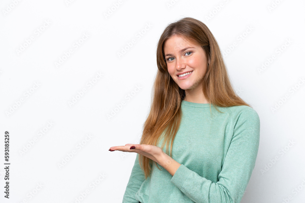 Young caucasian woman isolated on white background presenting an idea while looking smiling towards Young caucasian woman isolated on white background presenting an idea while looking smiling towards