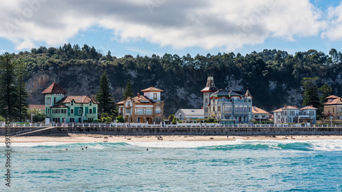 Picturesque houses by the sea, next to the beach in the north of Spain, Ribadesella, Asturias.