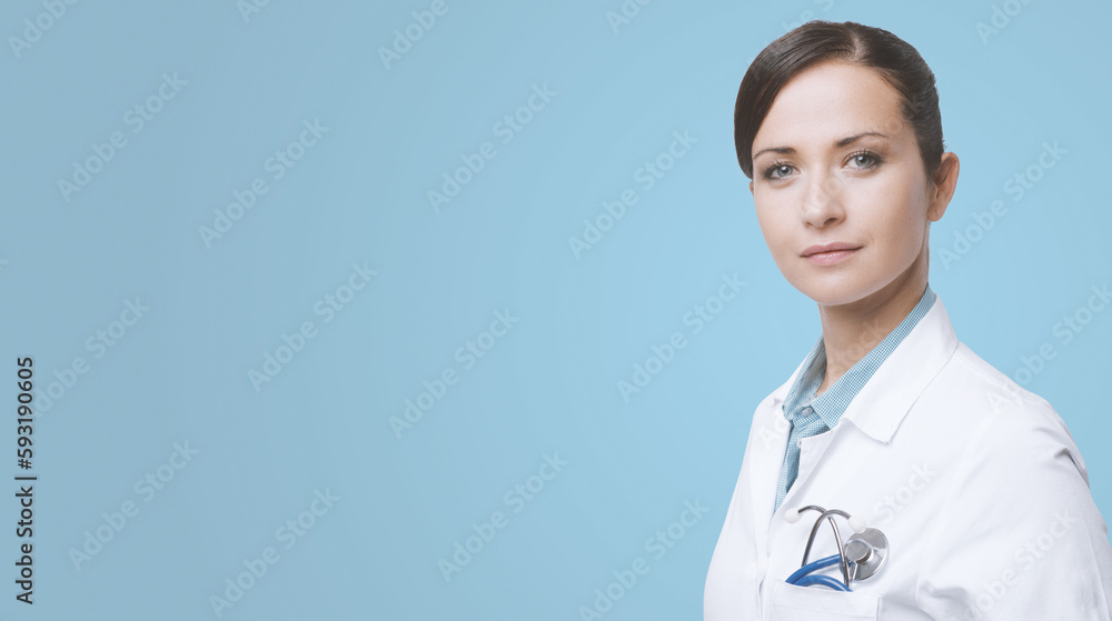 Confident female doctor with lab coat Confident female doctor with lab coat