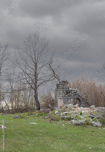Ruins of greek church of Saint Archangel Mihajlo (Michael) in Stikada, Croatia photo