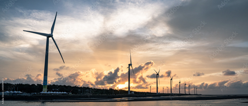 Obraz premium wind turbines in the sunset, Taiwan