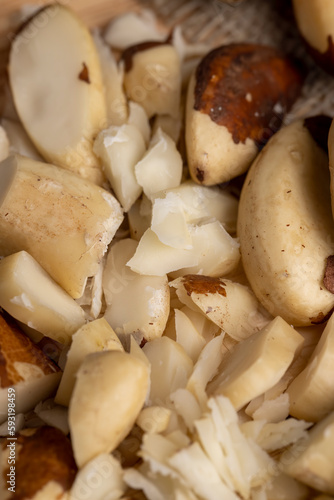 Fresh Brazil nuts peeled from the shell on the table