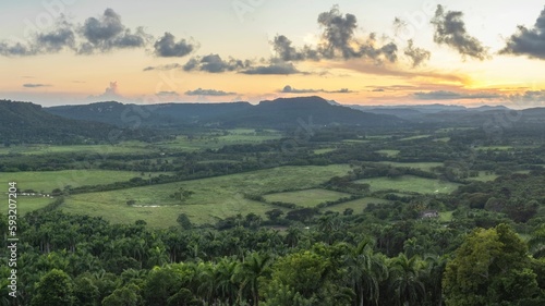Bird's eye view of fields and forests during a sunset in Cuba © Raul Navarro González/Wirestock Creators