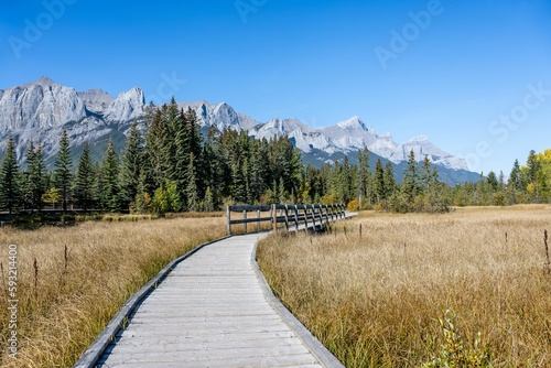 View of a boardwalk along Policeman's Creek in Canmore, Alberta