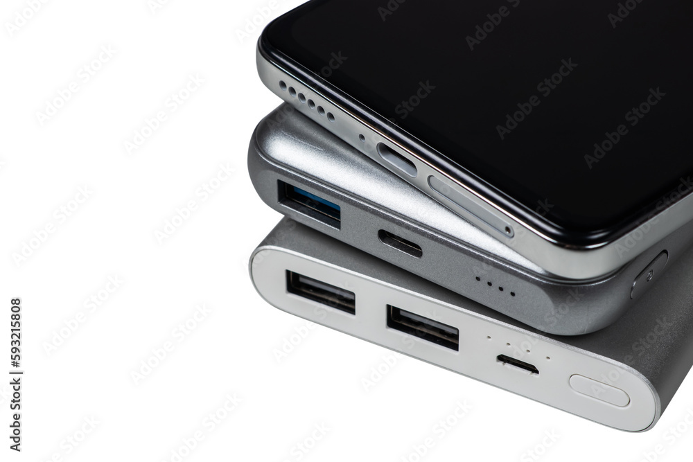 Powerbank for charging mobile devices on white. Smartphone with power bank. External battery for mobile devices Powerbank for charging mobile devices on white. Smartphone with power bank. External battery for mobile devices