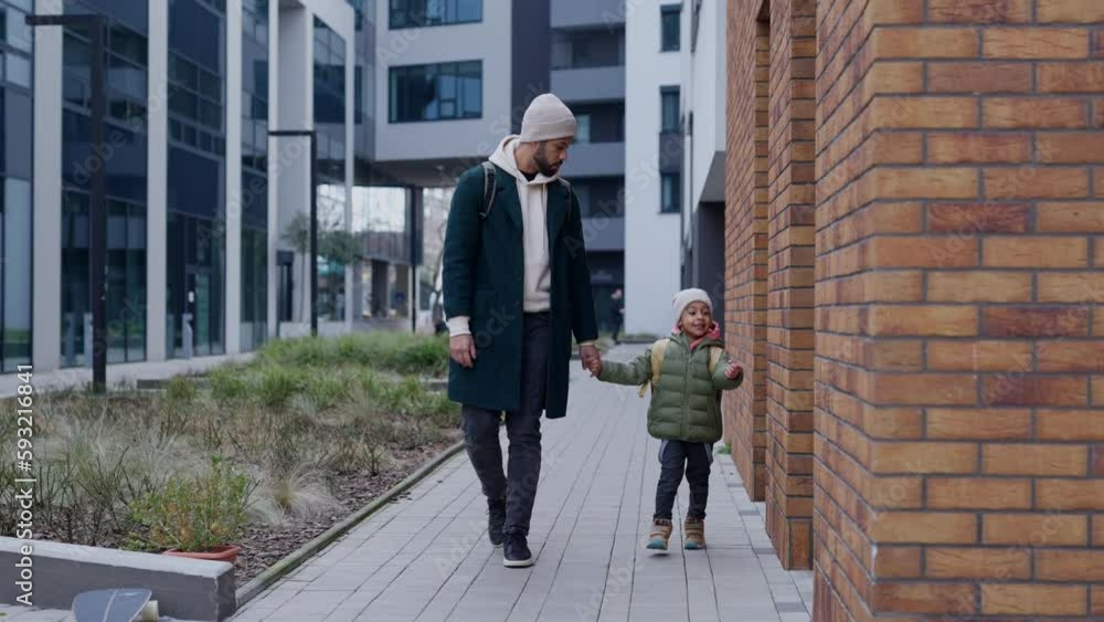 Young father and his little son during outdoor walk. Young father and his little son during outdoor walk.
