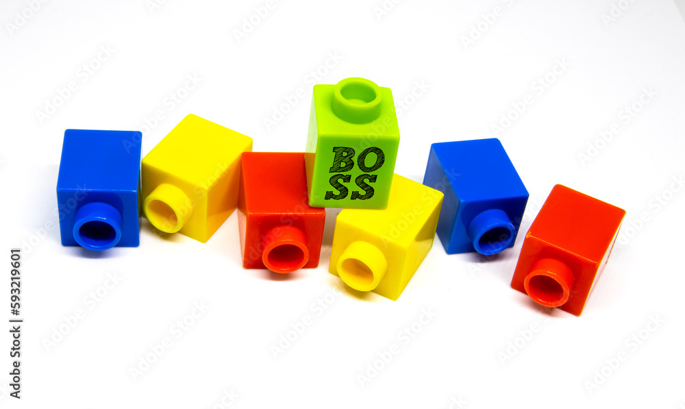 Plastic block boss manipulates workers photo concept Plastic block boss manipulates workers photo concept
