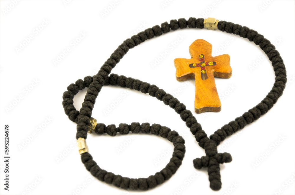 Rosary beads on white background