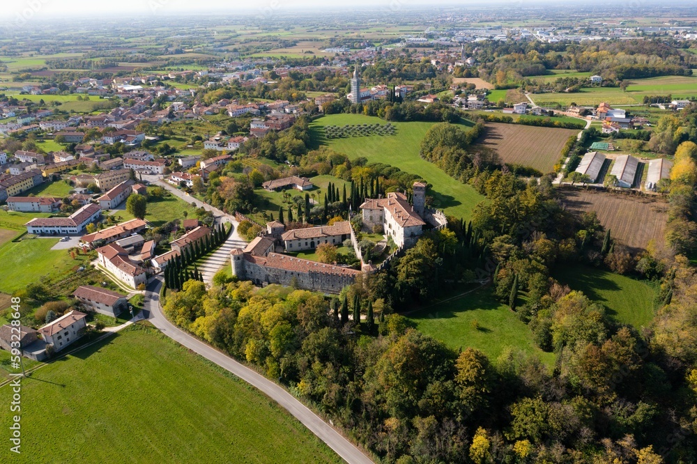 Aerial shot of the medieval Castello di Villalta in Friuli Italy with the town in the background Aerial shot of the medieval Castello di Villalta in Friuli Italy with the town in the background