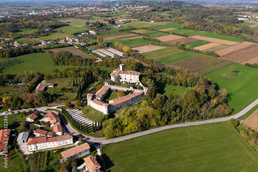Aerial shot of the medieval Castello di Villalta in Friuli Italy with the town in the background