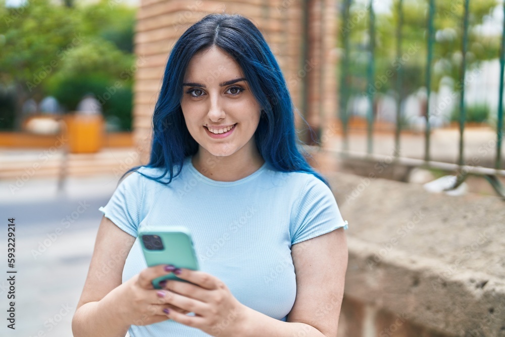 Young caucasian woman smiling confident using smartphone at street Young caucasian woman smiling confident using smartphone at street