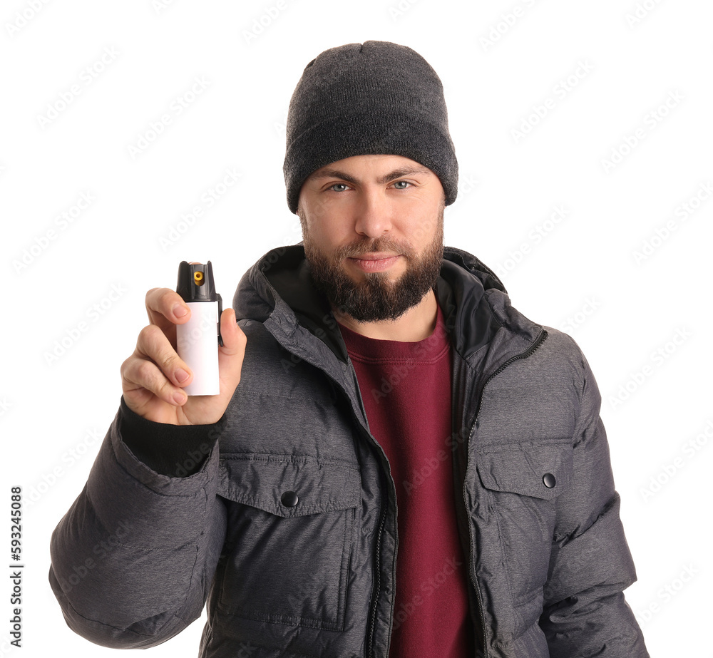 Young man with pepper spray for self-defence on white background Young man with pepper spray for self-defence on white background