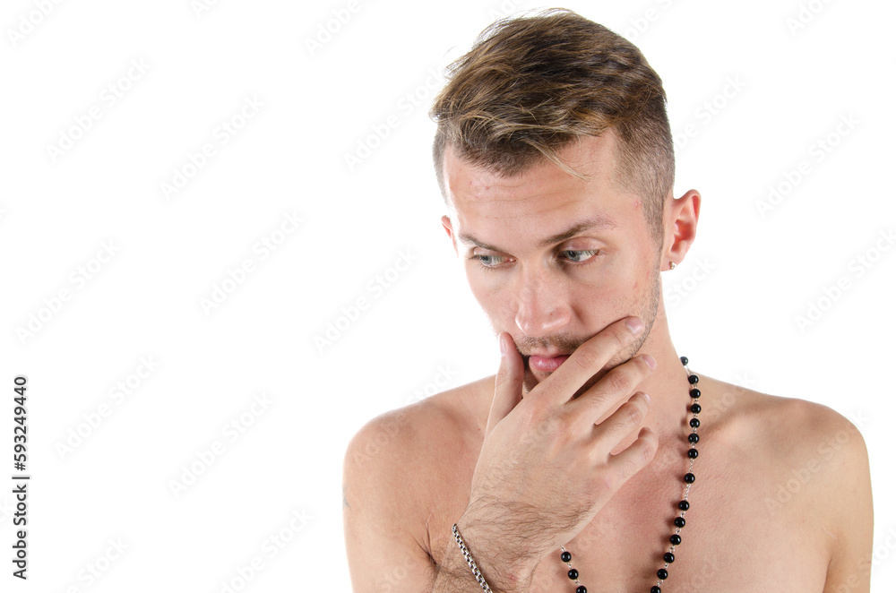 Obraz premium Young attractive man posing in the studio. White background.