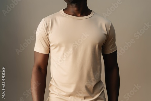 Black man model wearing a plain beige short sleeved t-shirt, isolated on a blank background. Mock-up, torso only. Generative AI illustration.