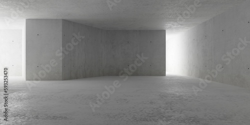 Abstract large, empty, modern concrete room with angled divider wall in the center and and rough floor - industrial interior background template