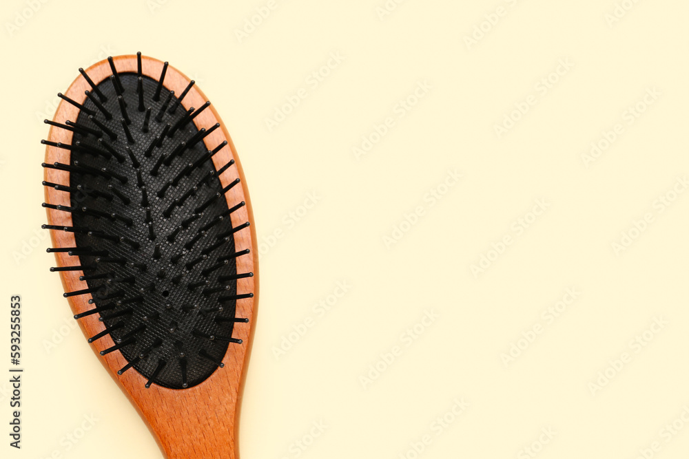 Hair brush on beige background Hair brush on beige background