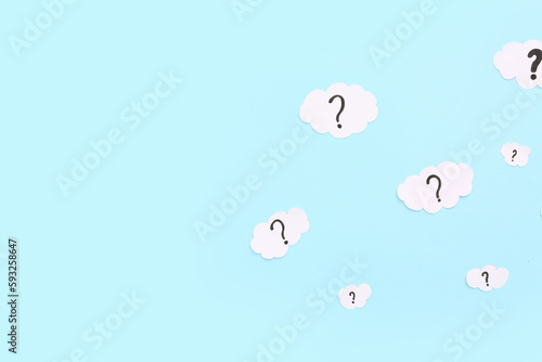 Paper clouds with question ...