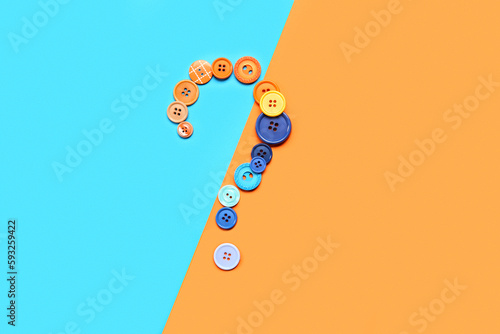 Question mark made of butto...
