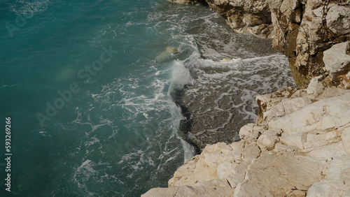 waves of mediterranean sea splashing on coastline of French Riviera