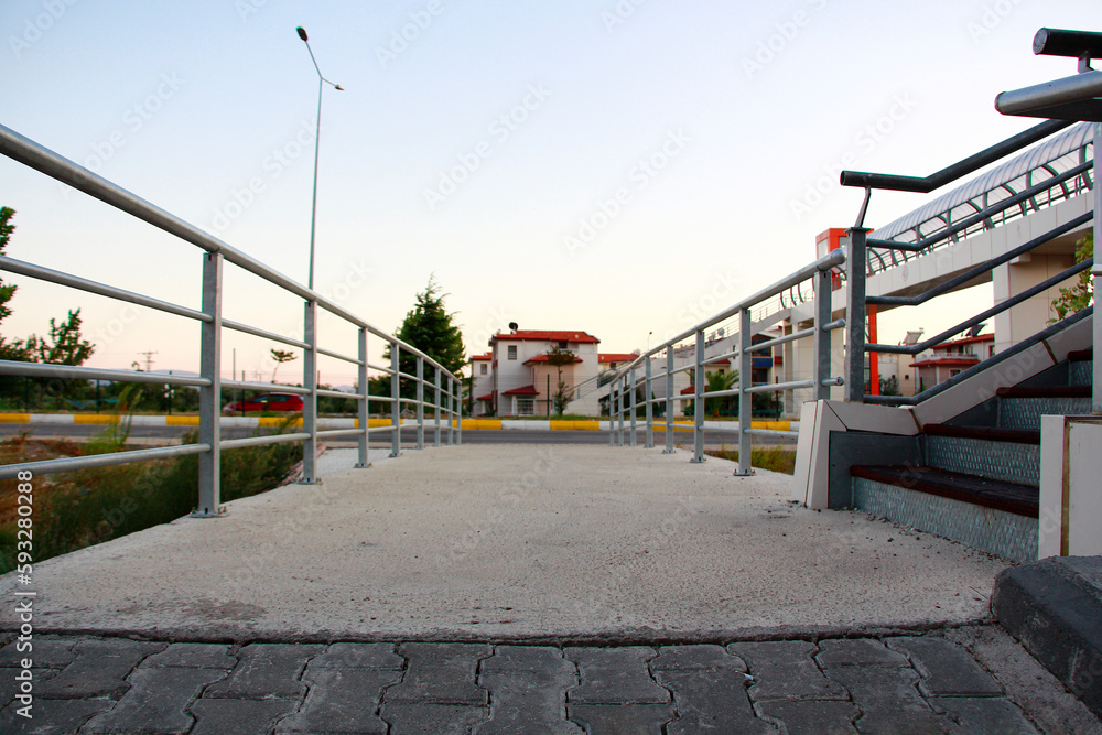 concrete stairs and railing in a park, closeup of photo. concrete stairs and railing in a park, closeup of photo.