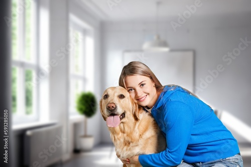 Happy young female with cute smart dog