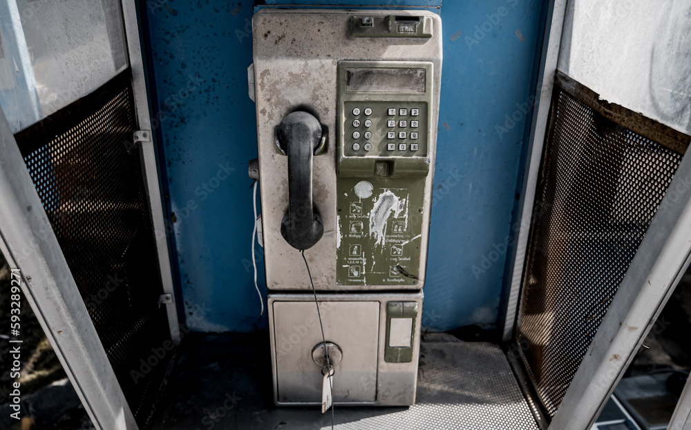Old and dirty street phones at the city landfill Old and dirty street phones at the city landfill