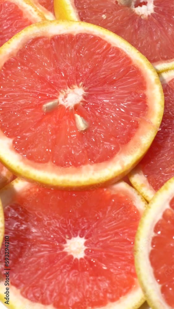 Grape fruit in 360 degree motion. Grape fruit slices rotating. Grape fruit in 360 degree motion. Grape fruit slices rotating.