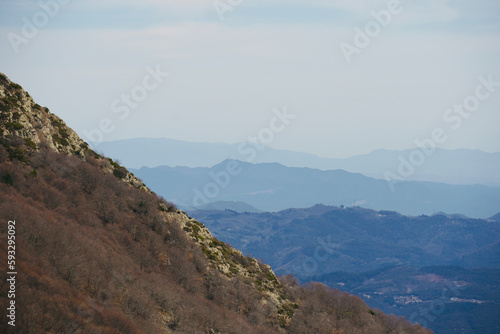 Beautiful landscape from the top of the mountain with blue sky. Views of the Valles Oriental from the Montseny mountain, Catalonia, Spain. 