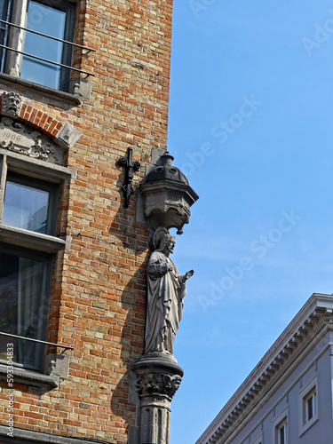 Bruges, April 2023: Magnificent facades of the buildings of Bruges, the Venice of the North