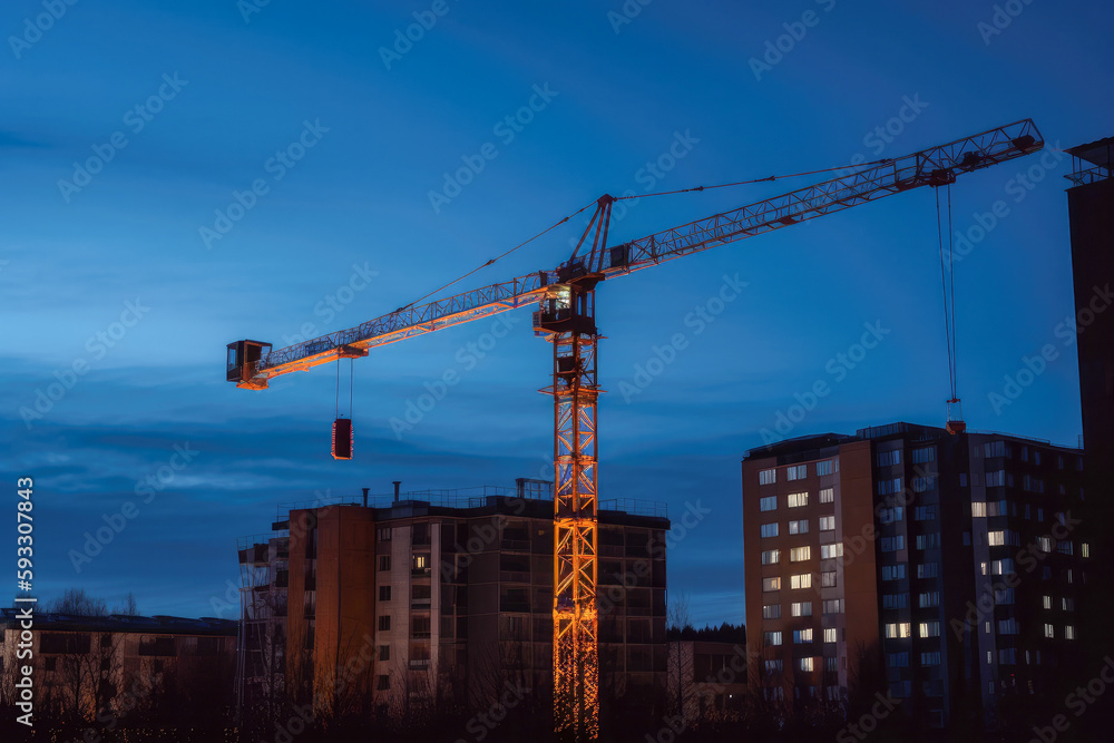 Construction crane at twilight, with cityscape background. High quality generative ai