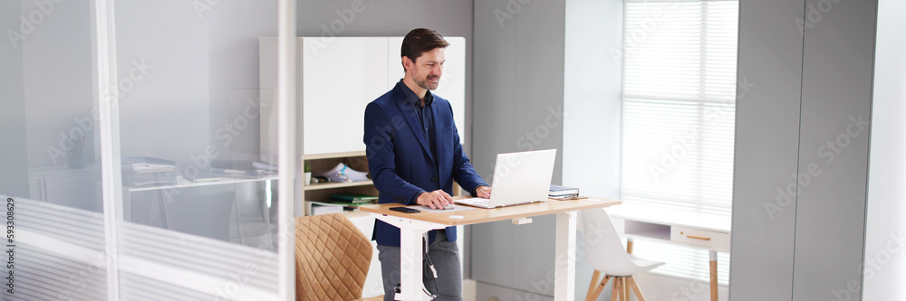 Adjustable Height Desk Stand In Office Adjustable Height Desk Stand In Office