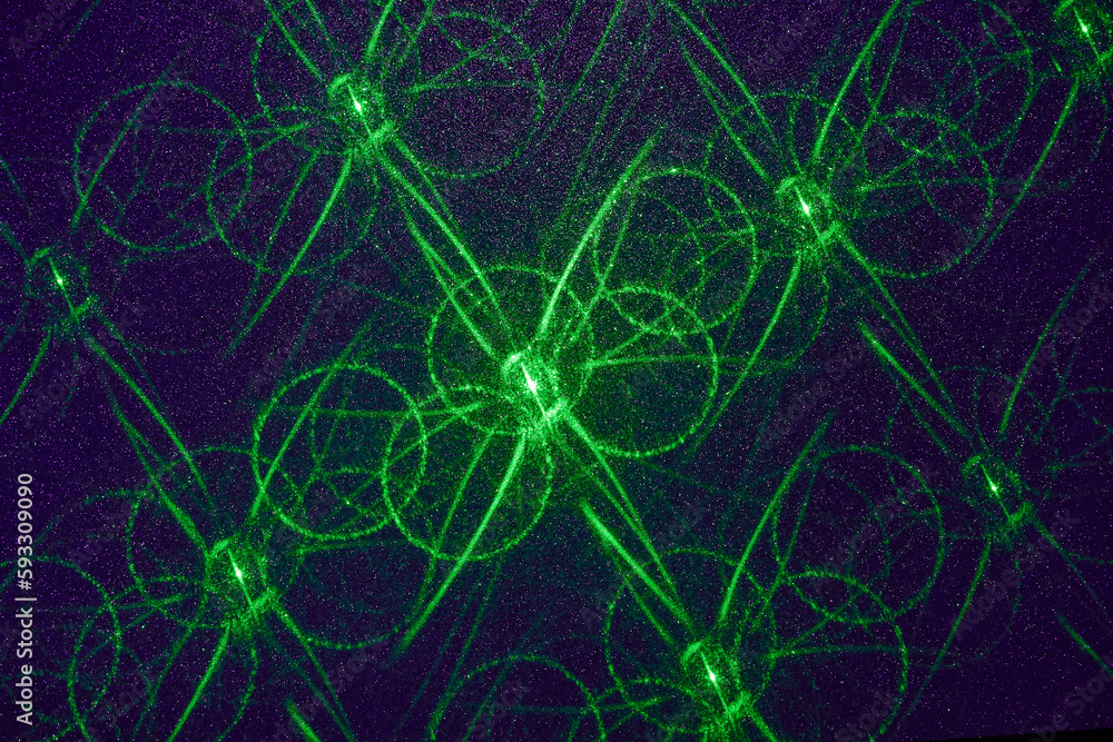 On a dark blue background in fine grain, a pattern of green figures On a dark blue background in fine grain, a pattern of green figures