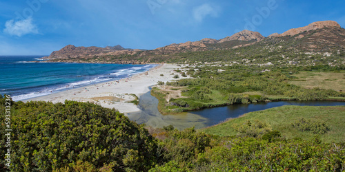 Coastal landscape at the Plage de l'Ostriconi, a protected natural beach in Corsica. Impressive sand dune landscape at the beautiful Ostriconi beach, Desert des Agriates, Corsica island, France