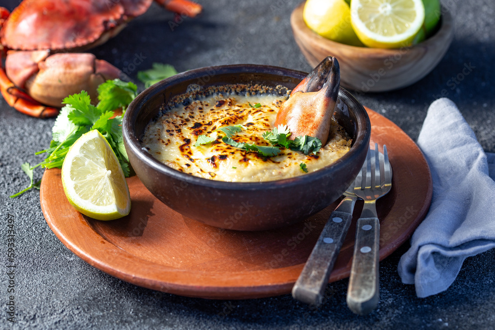CHILEAN FOOD. Baked crabmeat crab meat with cheese, cream and bread. Traditional dish of chilean