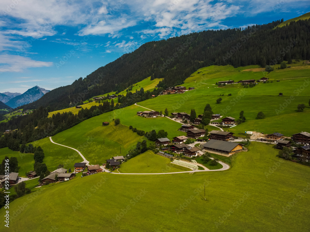 Aerial view Alpbach town in Kufstein, Tirol. Austria by drone. Alps mountains.