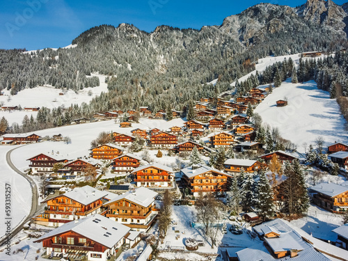 Aerial view Alpbach town in Kufstein, Tirol. Austria by drone. Alps mountains. Winter. Snow.