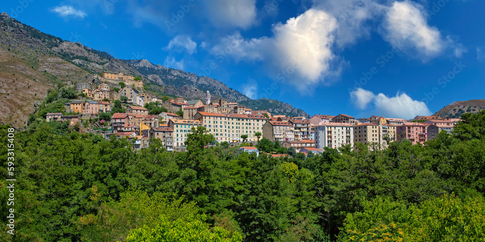 View of the town of Corte in the heart of Corsica. Corte is located in inland of Corsica surrounded by green forests and the cliffs of Restonica mountains, Corsica island, France