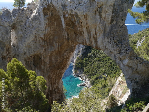 View from Natural Arch into the blue waters of the Tyrrhenian Sea. Capri, Italy