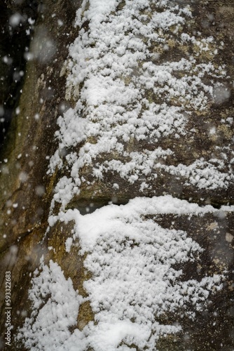 Snowfall on cliffside