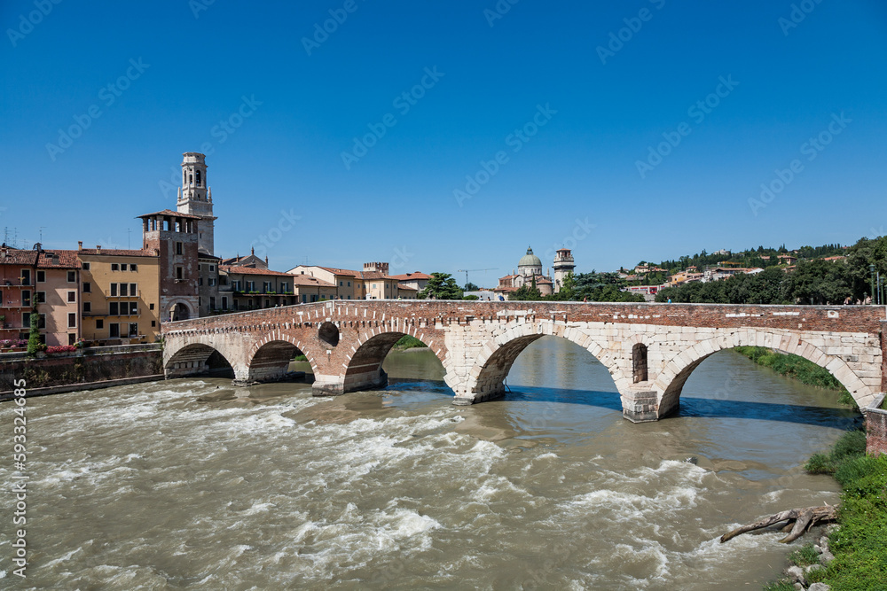   old roman bridge in Verona  spans the river Etsch