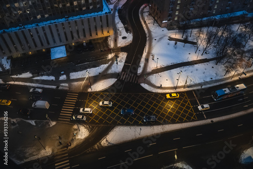 Panorama of streets of Moscow from above with the lights of cars from above. Moscow, Russia - 22 Nov 2022 