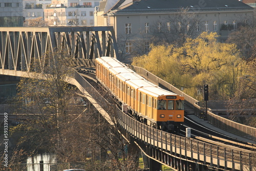 Metro train crossing a bridge