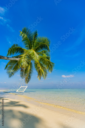 Fototapeta Naklejka Na Ścianę i Meble -  Tropical relax beach as summer island landscape with beach swing or hammock on palm, close to fantastic sea view. Amazing beach panorama vacation and summer holiday concept. Luxury panoramic travel
