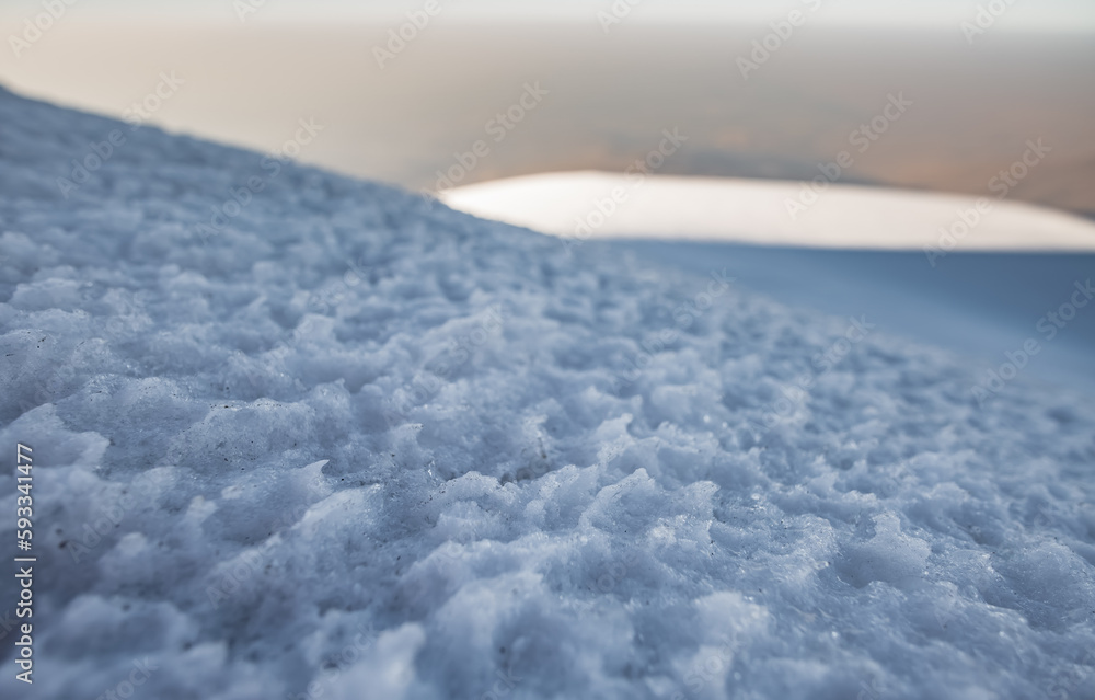 Snow in macro on the surface of the glacier on the top of Mount Ararat, texture of snow in macro