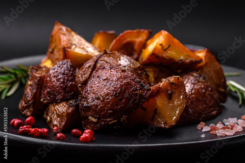 Delicious potatoes baked in their skins with rosemary and spices